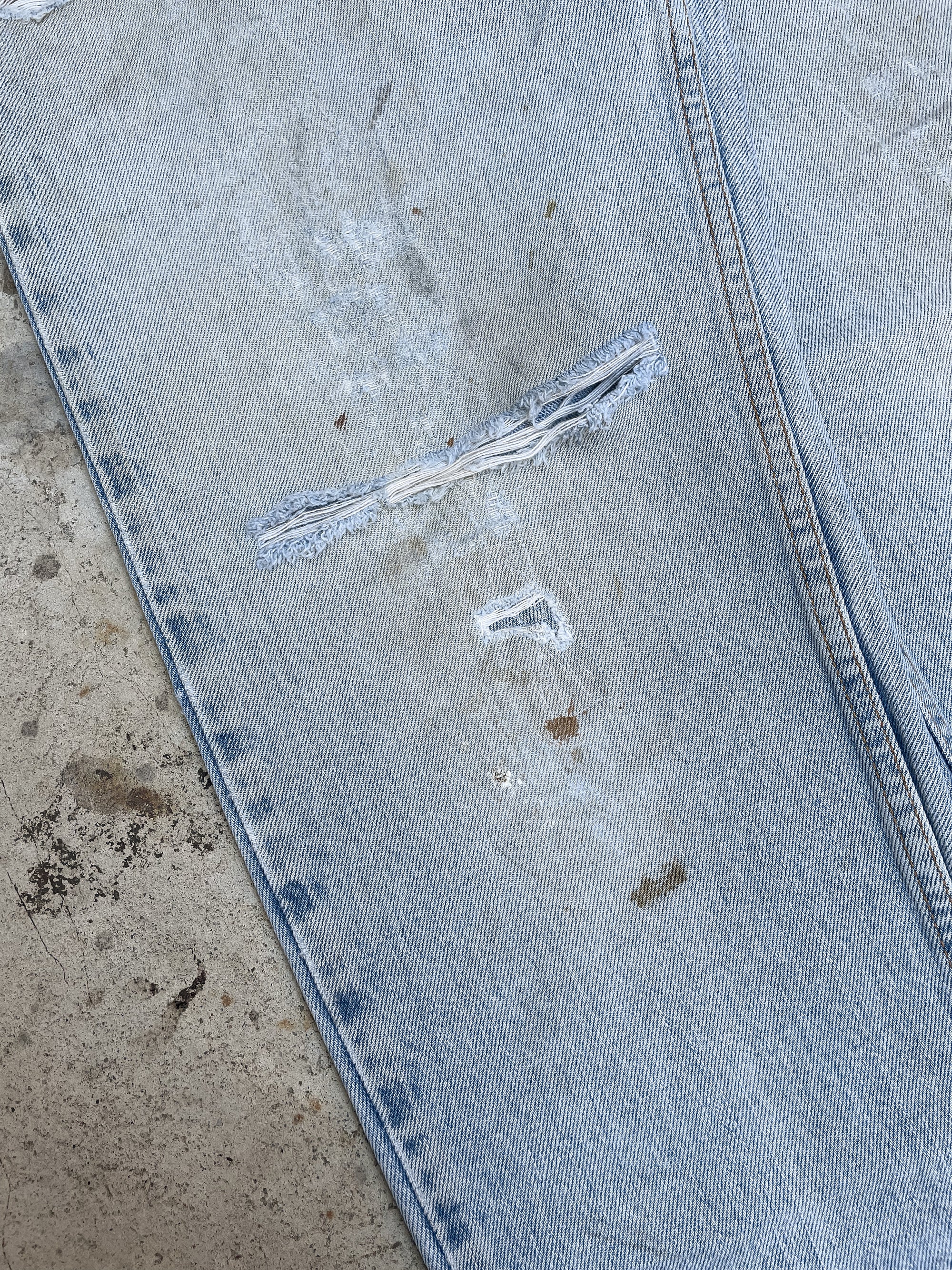 1990s Levi’s Distressed Faded Blue Repaired 550 (31X30)