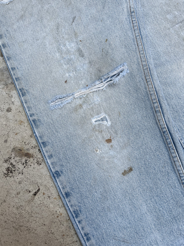 1990s Levi’s Distressed Faded Blue Repaired 550 (31X30)