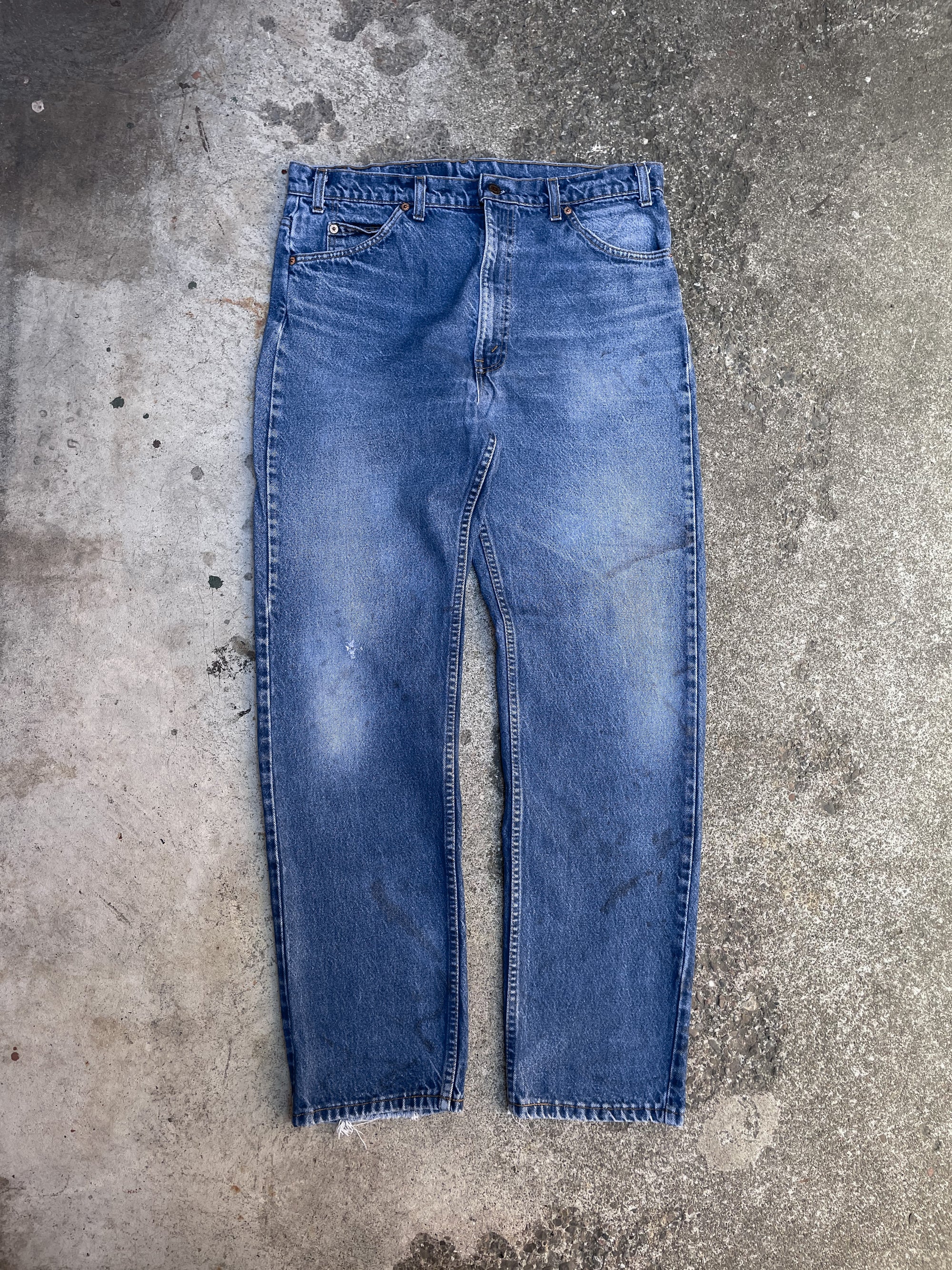 1990s Orange Tab Levis Worn In Blue 505 (35X31)