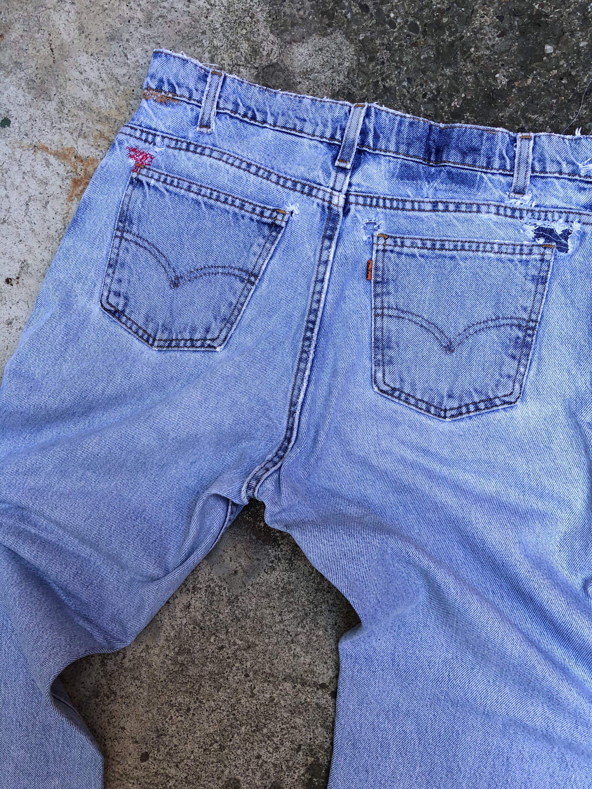 1990s Orange Tab Levis Repaired Faded Blue 518 (33X28)