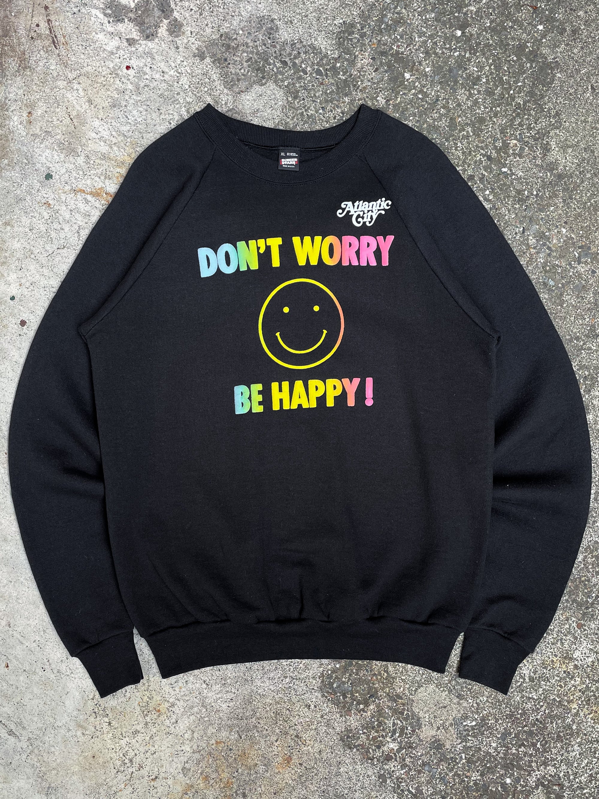 1980s “Don’t Worry Be Happy” Screen Stars Puff Print Raglan Sweatshirt