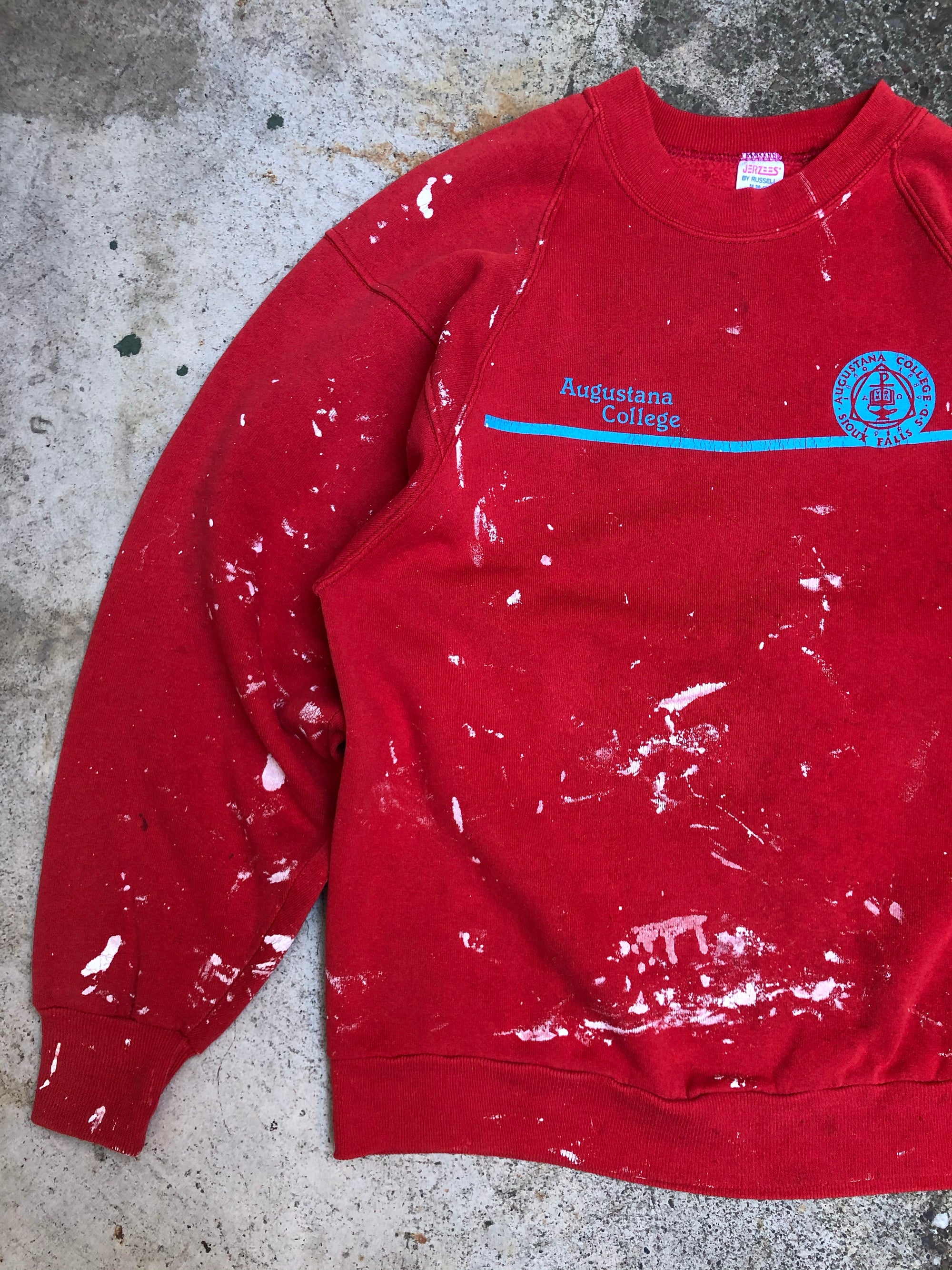 1980s Paint Faded Red “Augustana College” Raglan Sweatshirt (S/M)