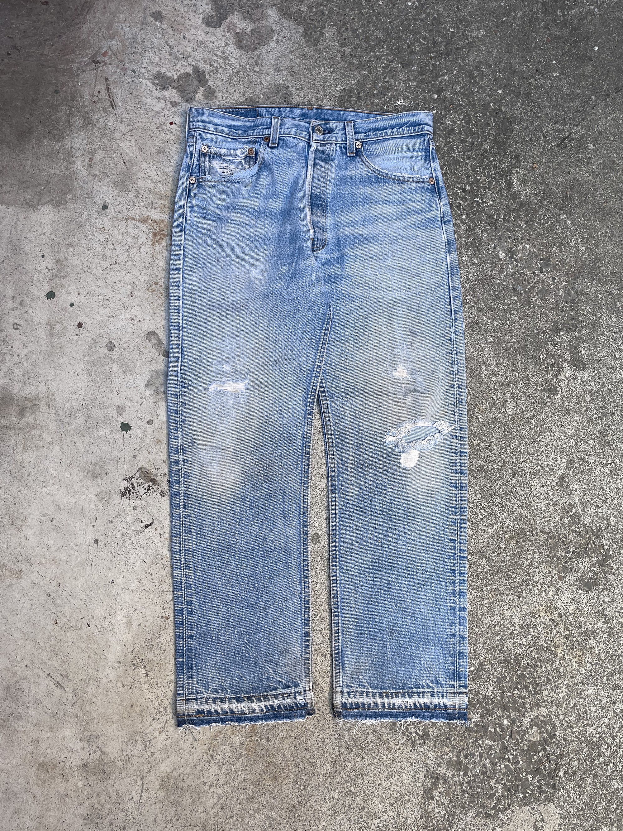 1990s Levis Distressed Repaired Faded Blue 501XX Released Hem (31X27)