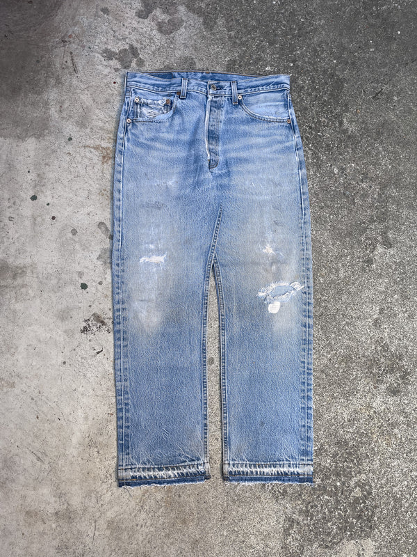 1990s Levis Distressed Repaired Faded Blue 501XX Released Hem (31X27)