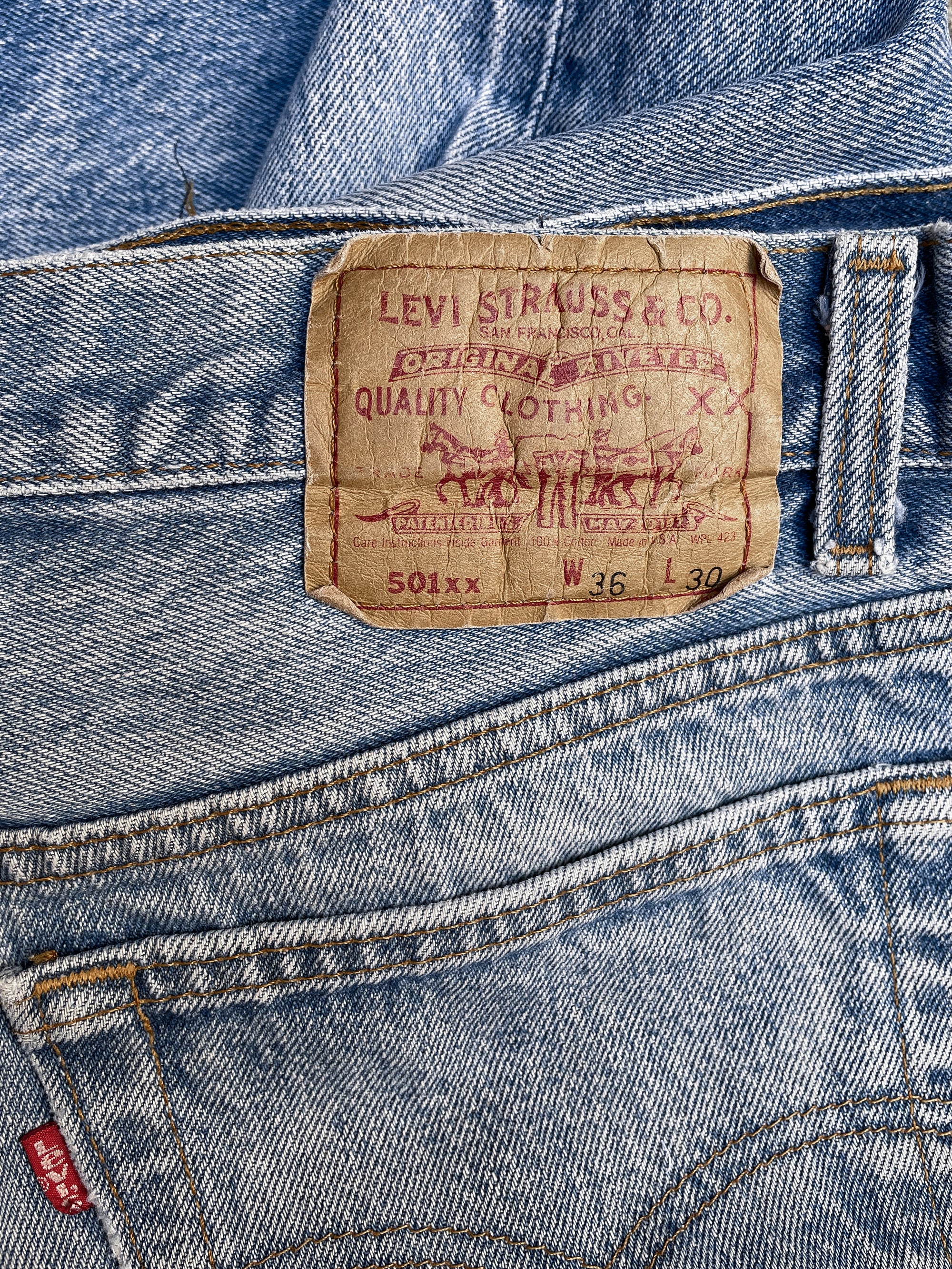 1990s Levi’s Repaired Faded Blue 501xx Released Hem (33X27)