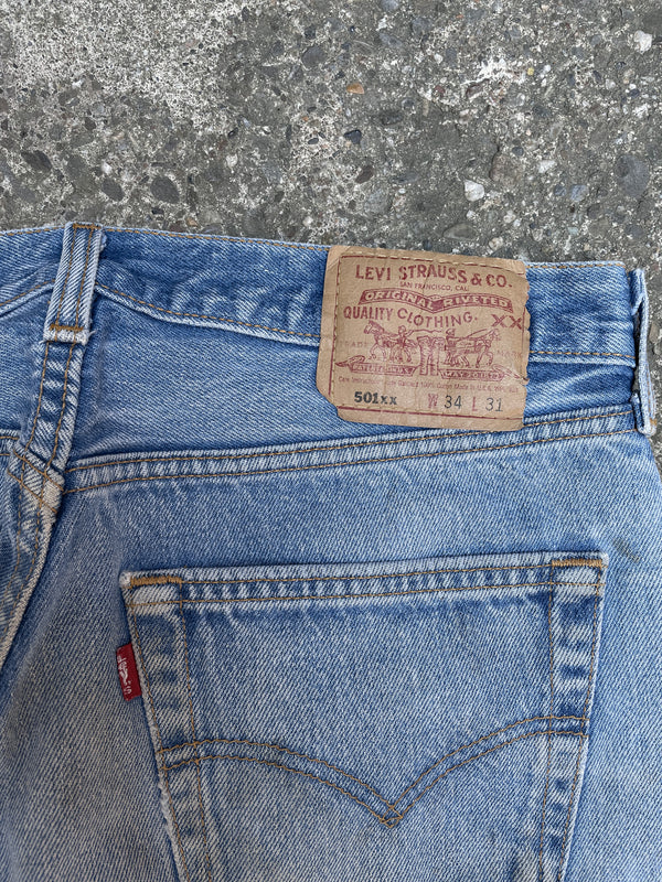 1990s Levi’s Faded Dirty Blue 501XX Released Hem (31X28)