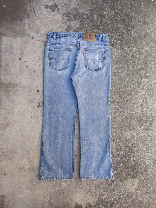 1990s Orange Tab Levis Faded Blue 517 (31X26)