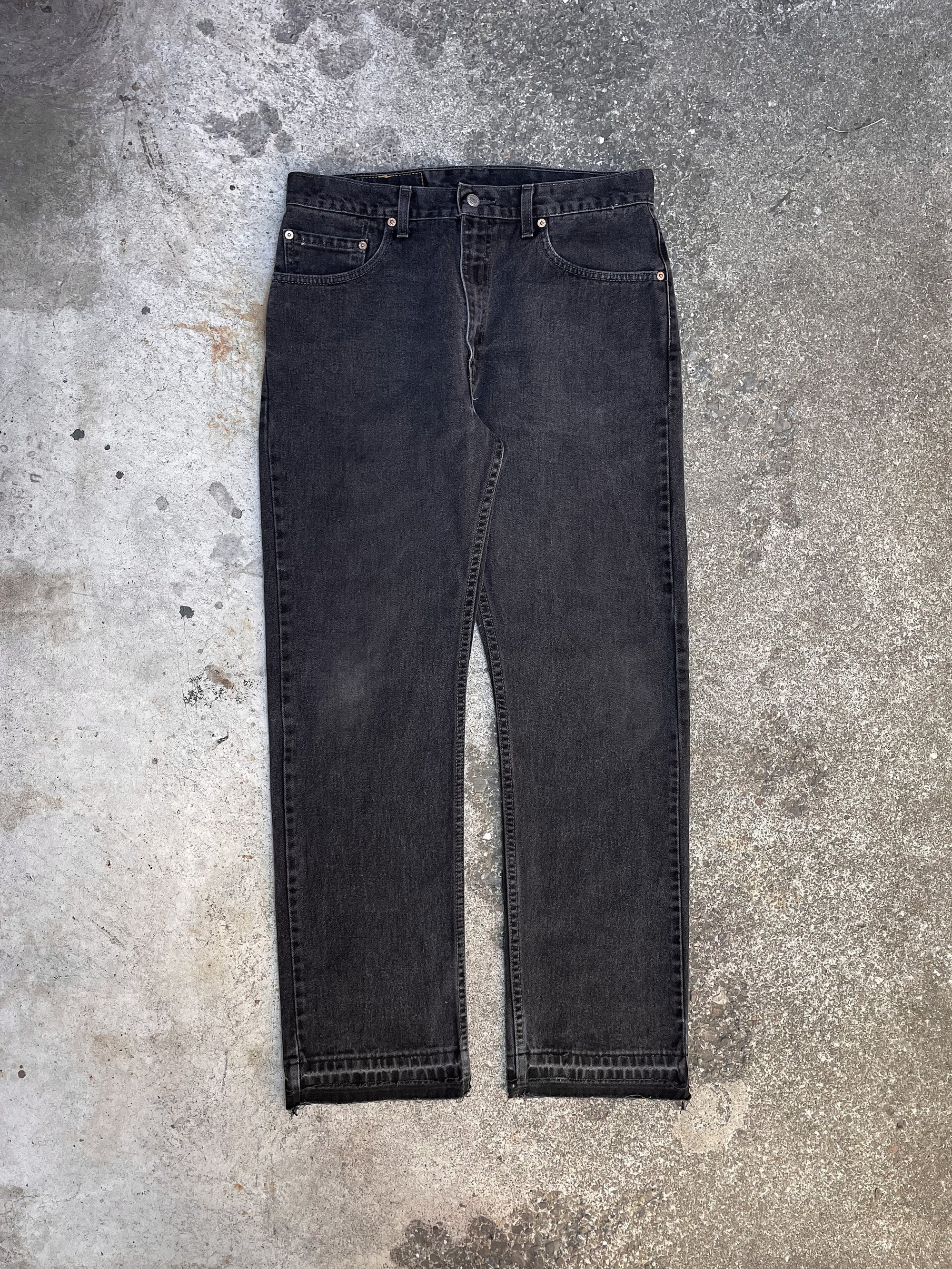 Vintage Levi’s Faded Black 505 Released Hem (33X30)