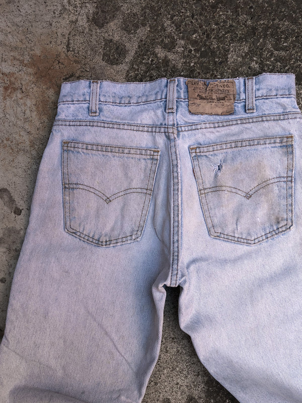 1980s Orange Tab Levis Thrashed Light Wash Blue 506 (28X28)