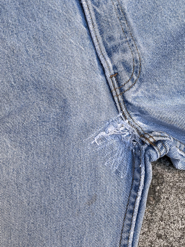 1990s Levi’s Repaired Faded Blue 501 Released Hem (31X29)