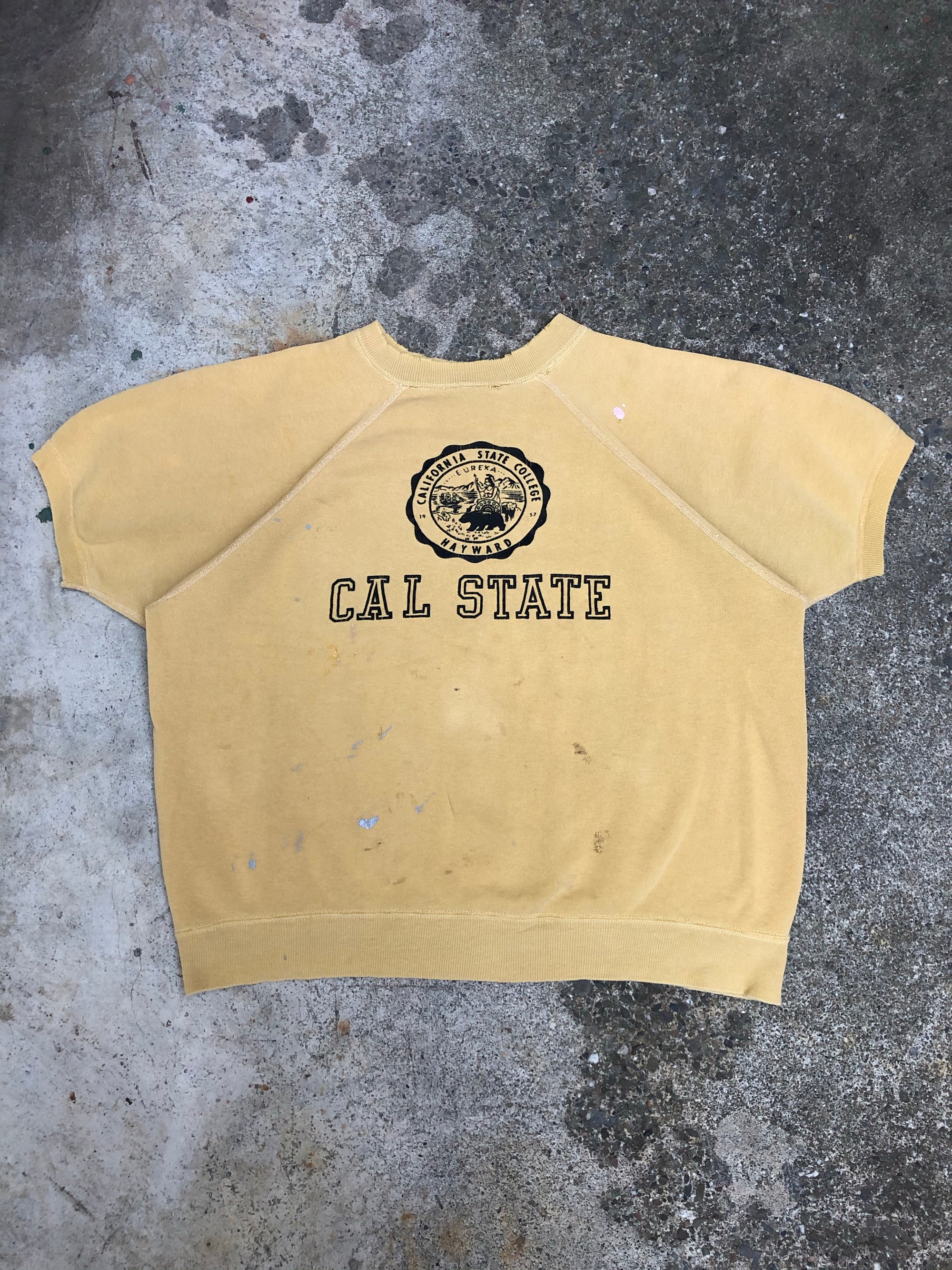 1960s Faded Painted Yellow “Cal State Hayward” Short Sleeve Raglan Sweatshirt