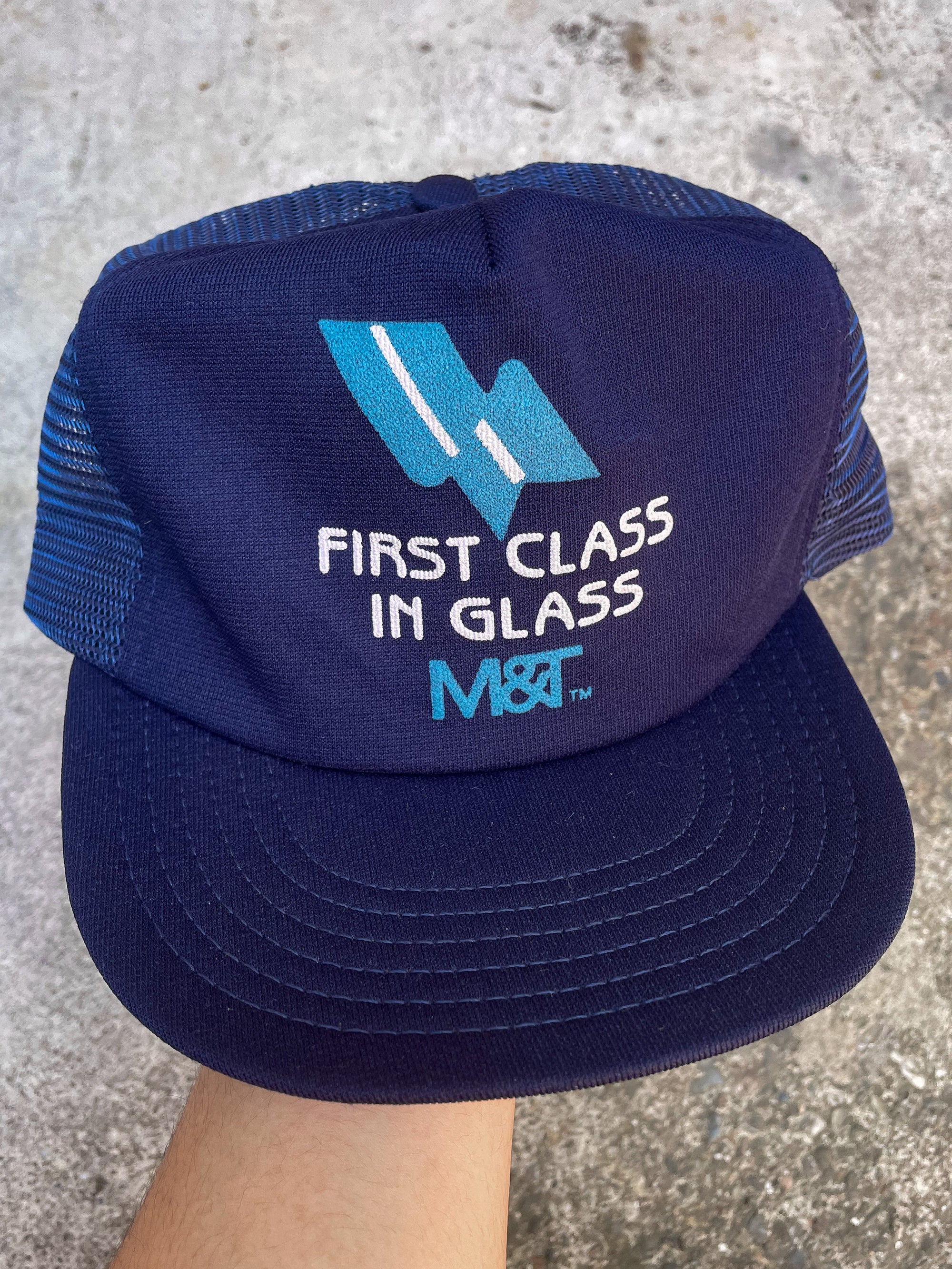 1980s “First Class In Glass” Trucker Hat