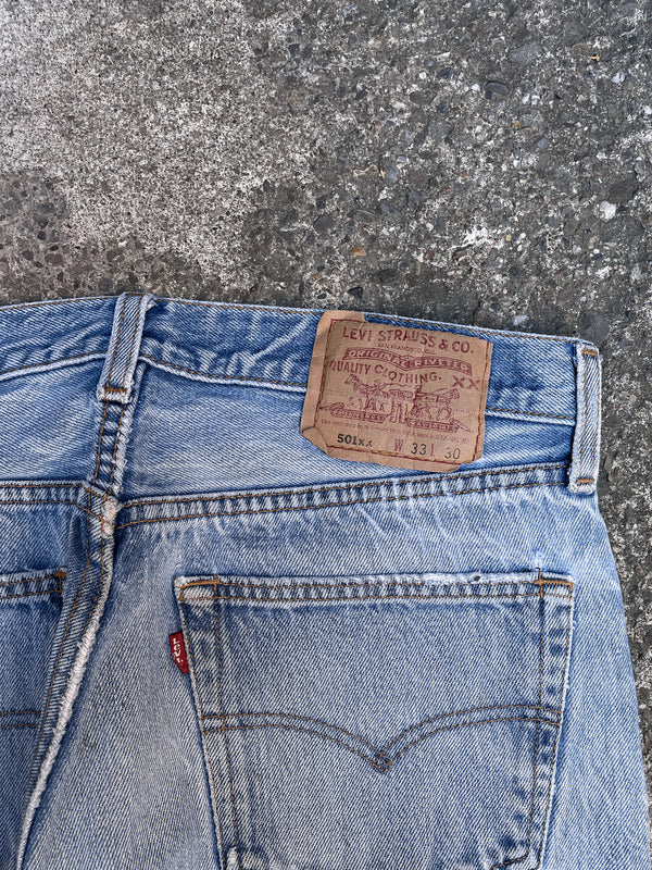 1990s Levis Distressed Repaired Faded Blue 501XX Released Hem (31X27)