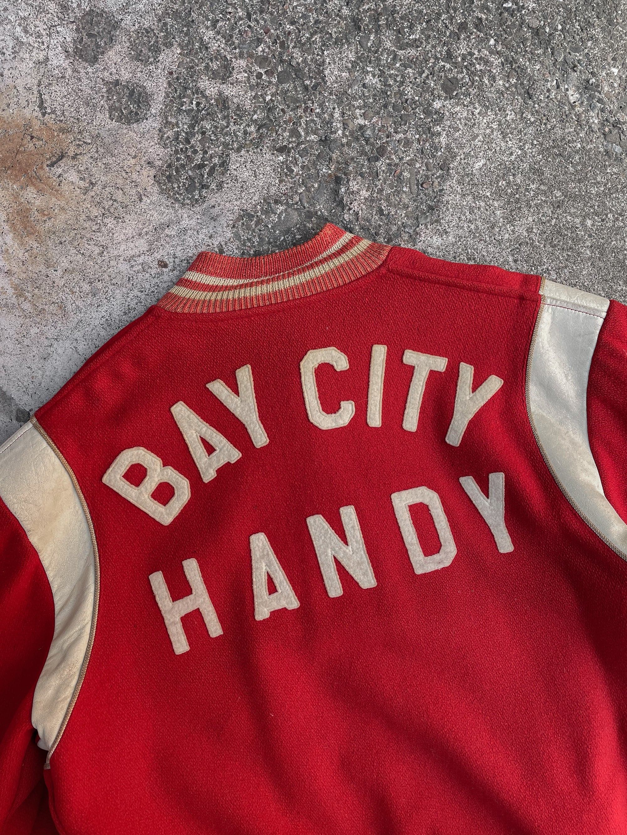 1970s Faded Red “Bay City Handy” Chain Stitched Varsity Jacket