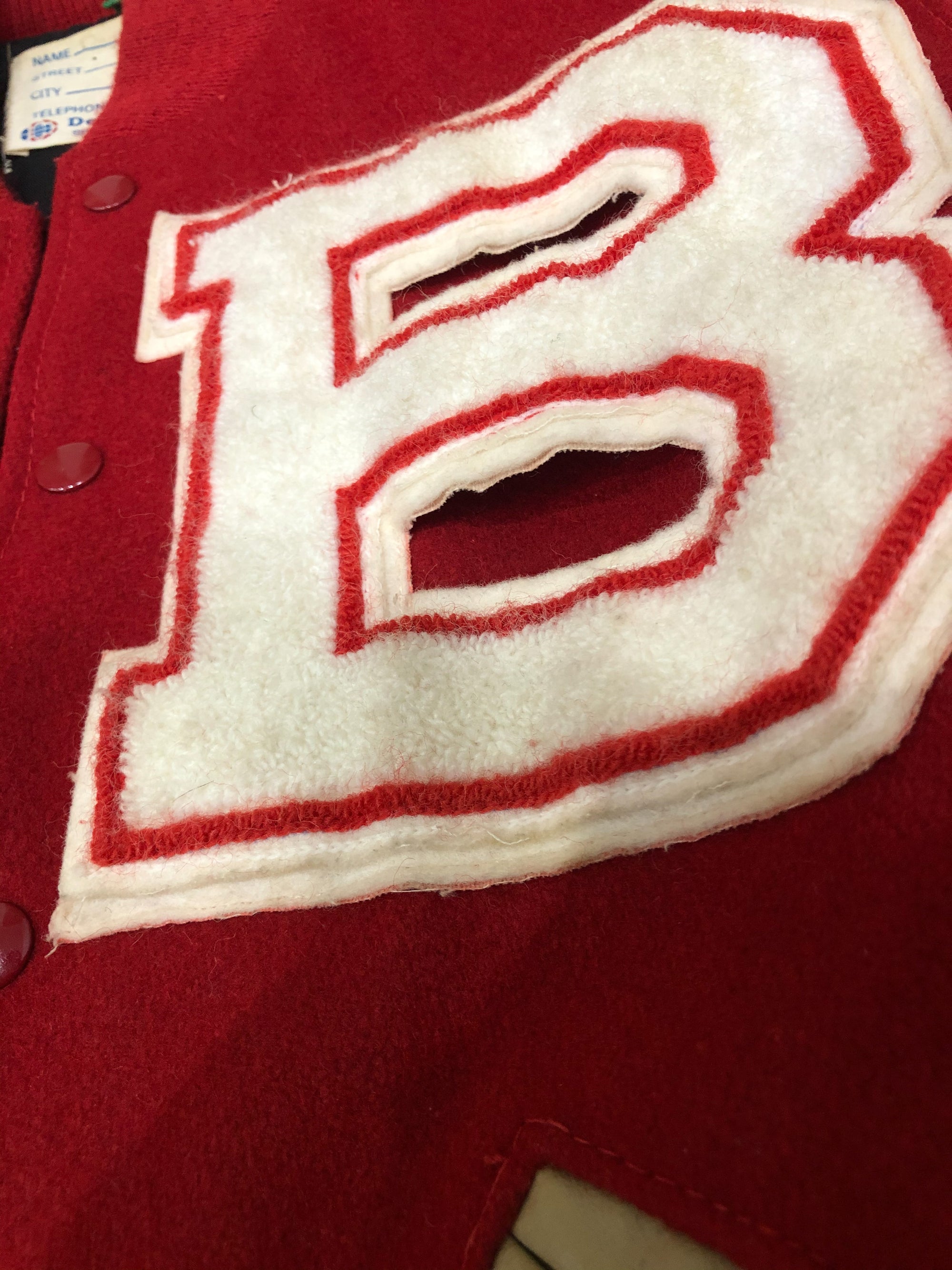 1980s Faded Red “Bronco” Chain Stitched Varsity Letterman Jacket