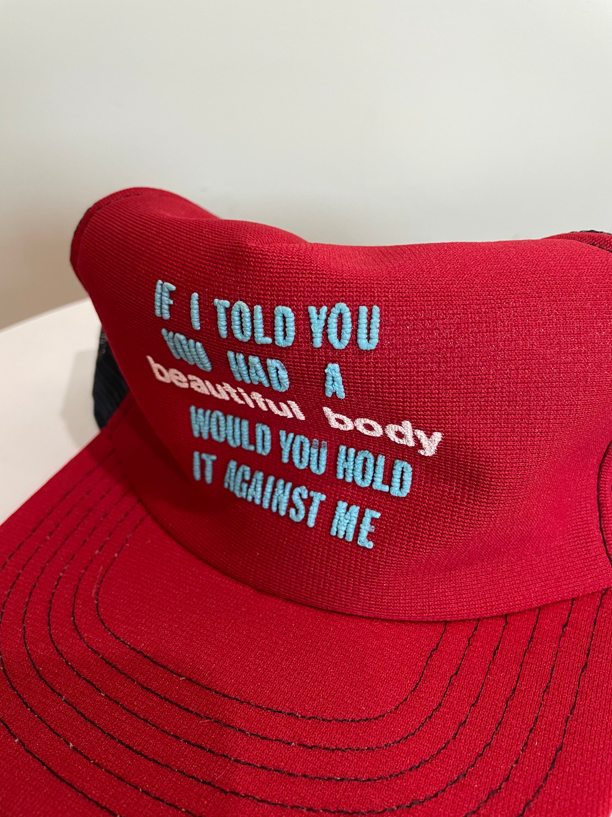 1980s “If I Told You You Had A Beautiful Body…” Trucker Hat