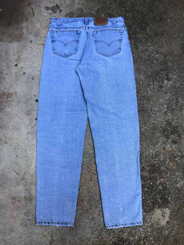 1990s Levis 550 Light Wash Worn In Blue (33X33)