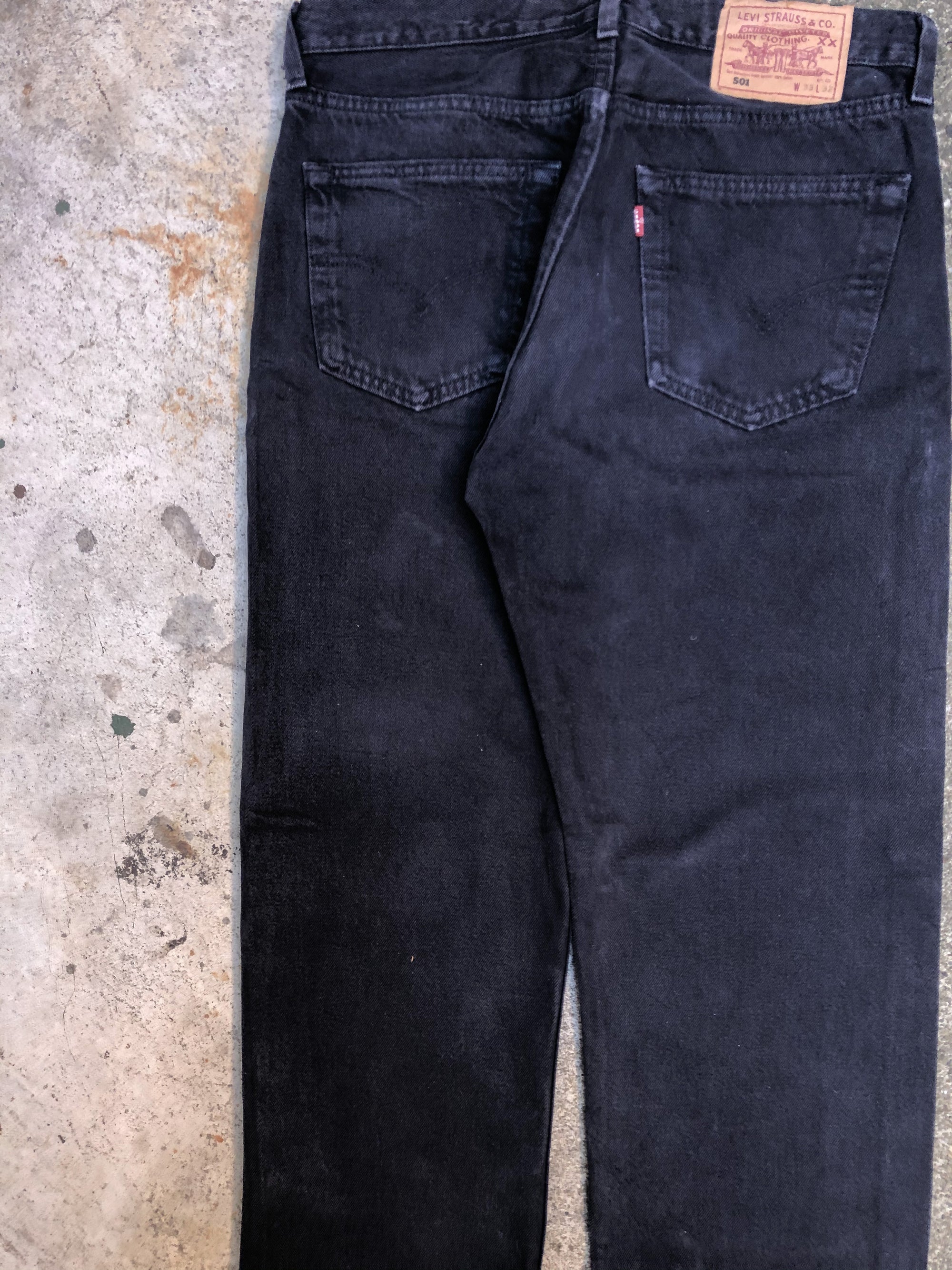 1990s Levis Faded Midnight Oil 501 (31X31)