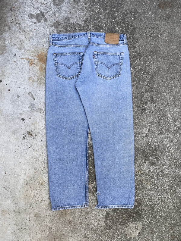 1990s Levi’s Faded Blue 501 Split Hem (32X26)