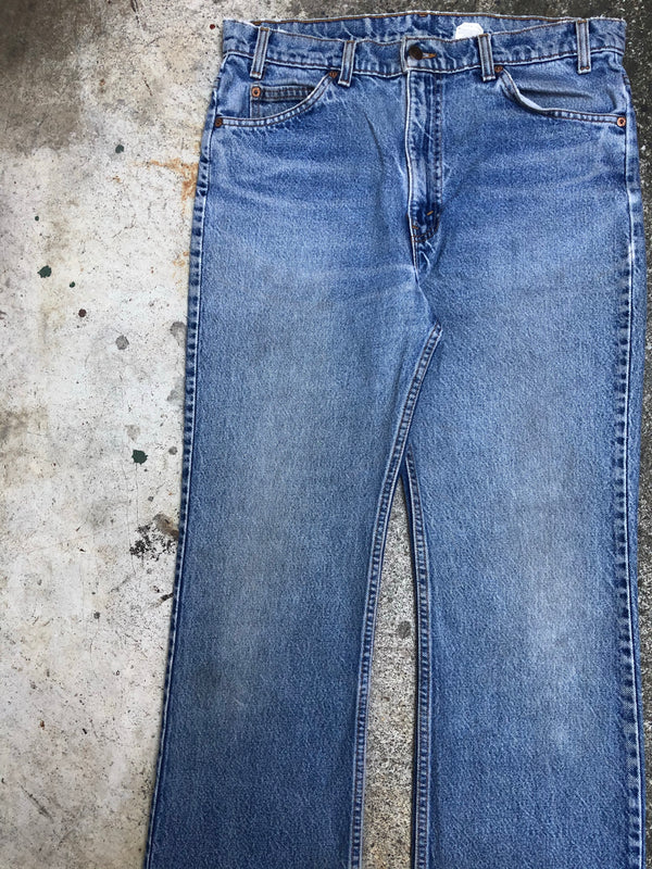 1990s Orange Tab Levis Faded Blue 517 (35X31)