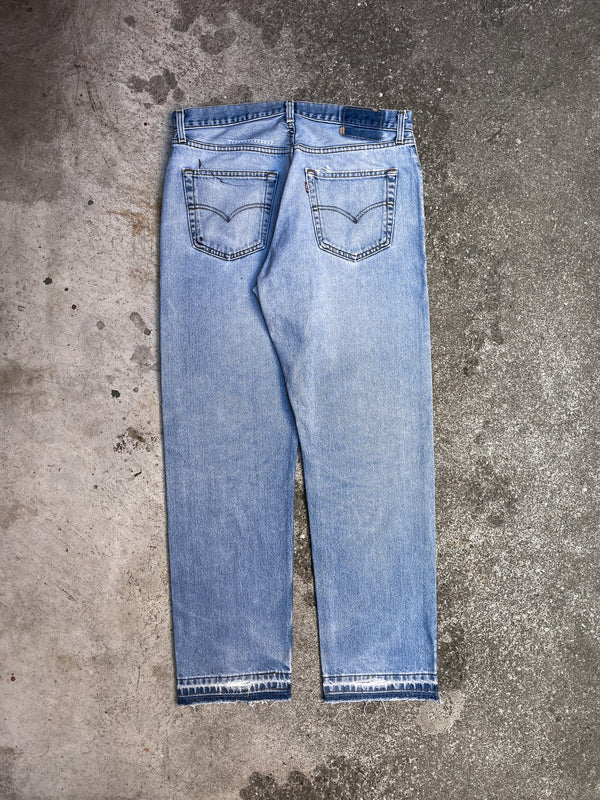 Vintage 00s Levi’s Repaired Faded Blue 522 Released Hem (34X31)