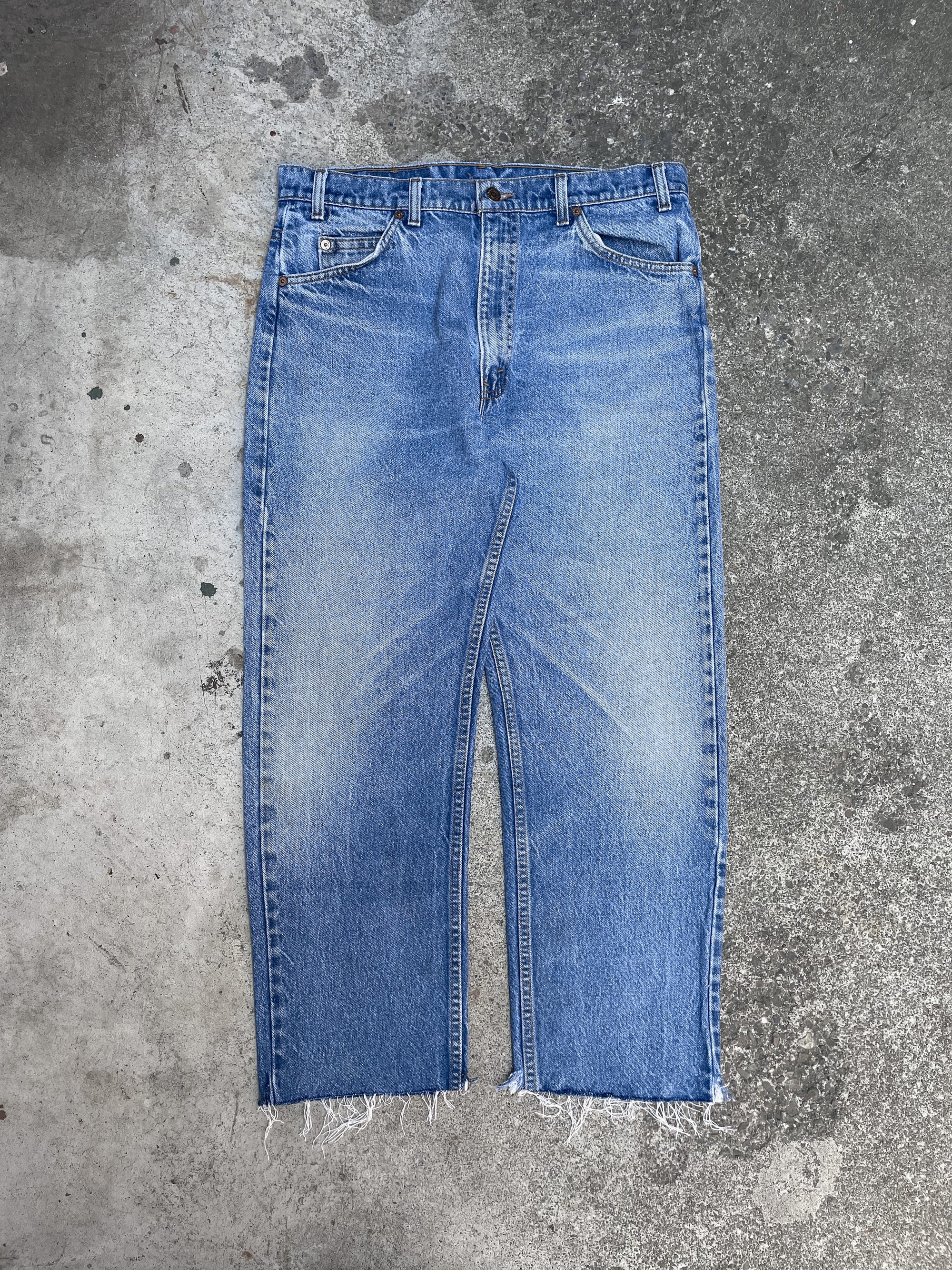 1990s Orange Tab Levi’s Faded Blue 505 Raw Hem (34X26)