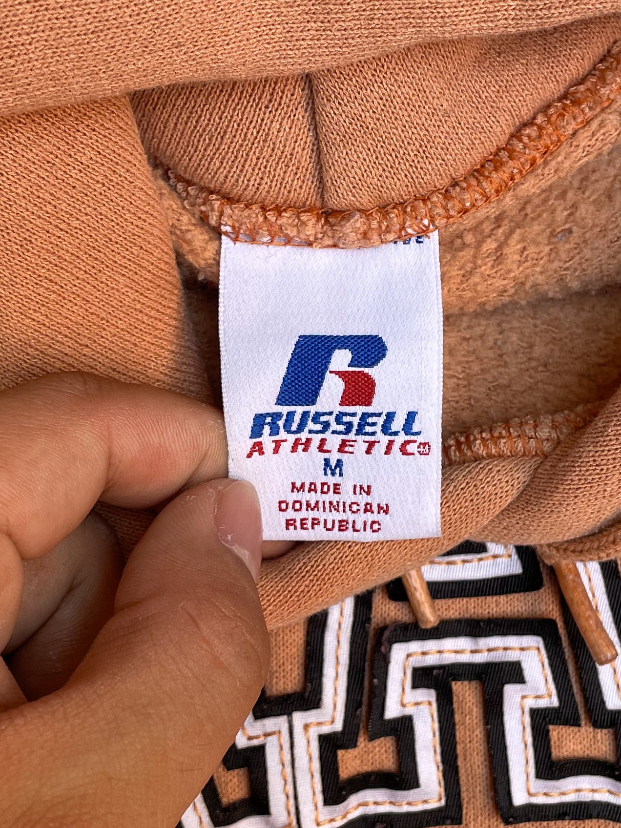 Vintage Russell “Grace” Faded Pale Orange Hoodie (M)