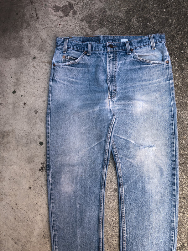 1990s Orange Tab Levis Faded Blue 505 Released Hem (35X27)