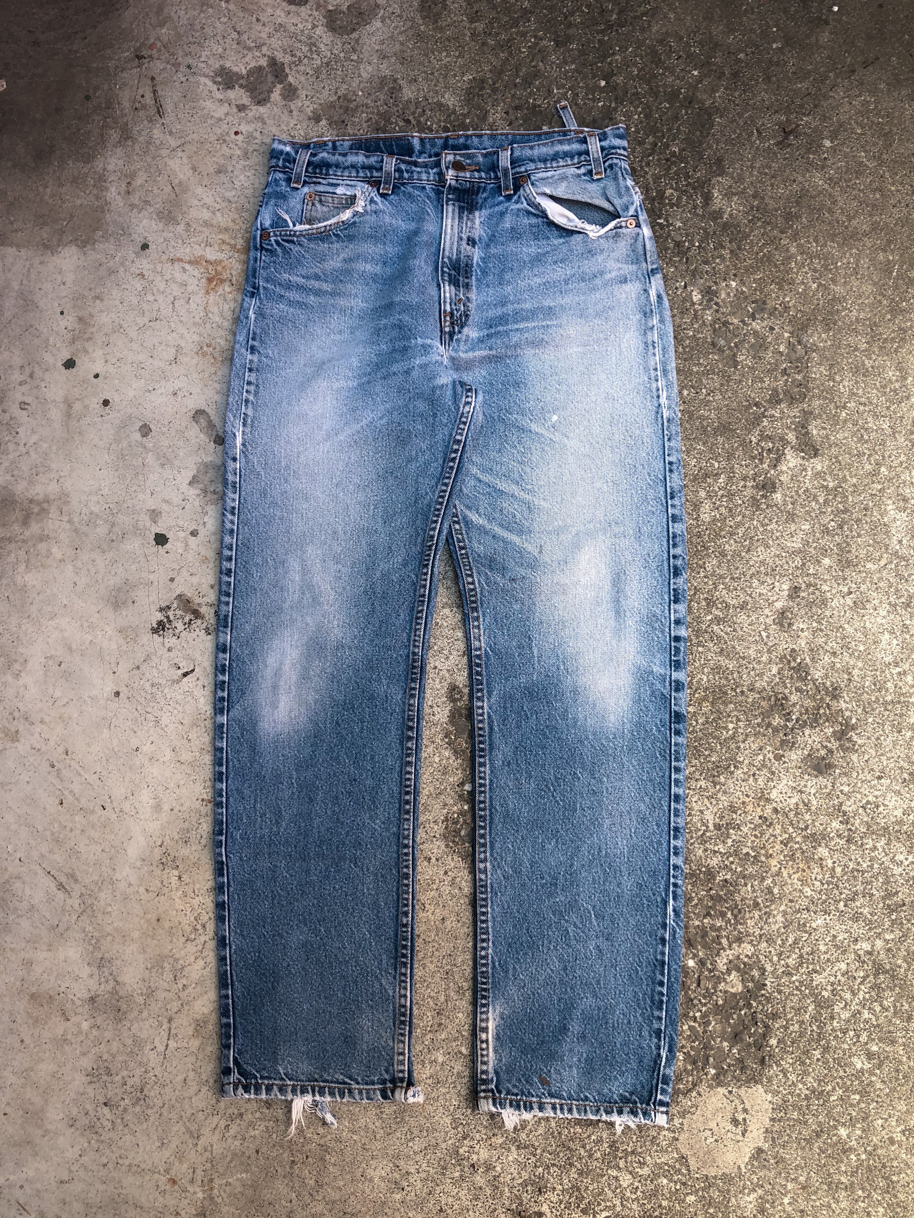 1990s Orange Tab Levis Heel Bite Blue 505 (33X31) – DAMAGED GLITTER