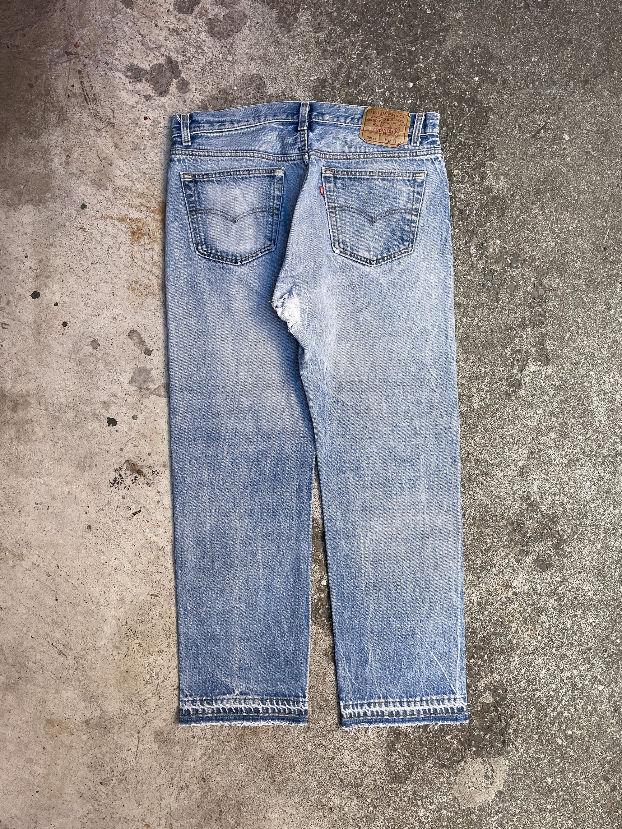 1990s Levi’s Repaired Faded Blue 501xx Released Hem (33X27)