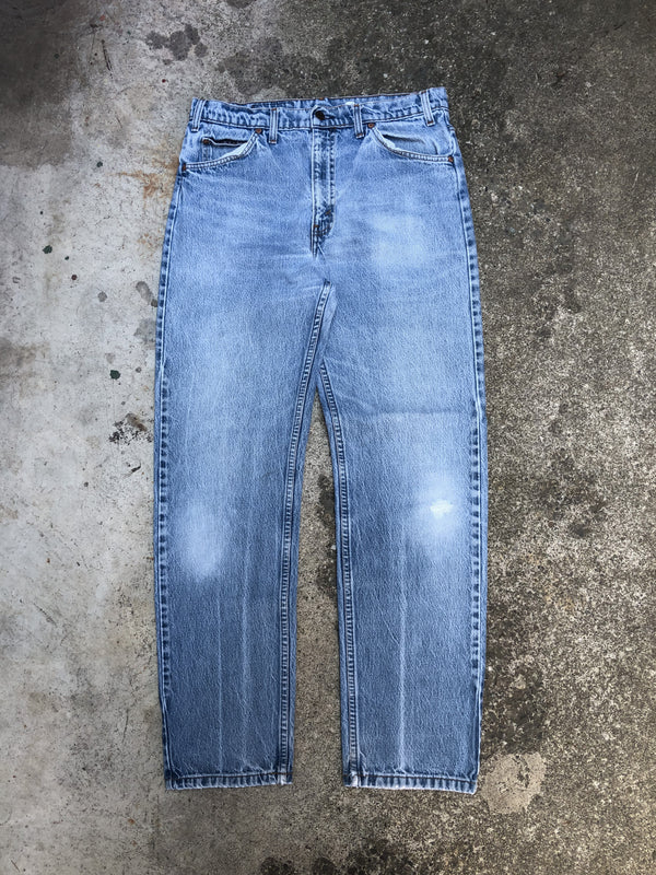 1990s Orange Tab Levis Faded Blue 505 (33X30)