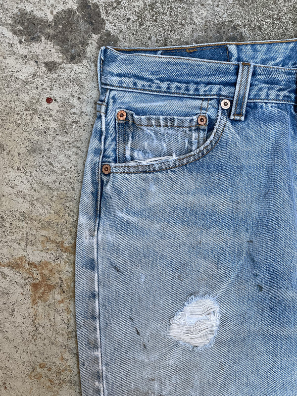 1990s Levi’s Distressed Faded Blue 501XX Raw Hem (30X27)