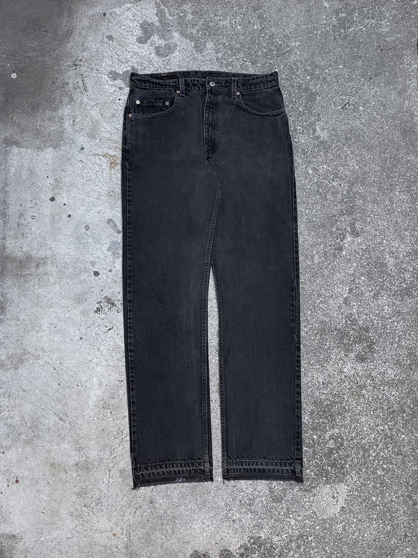 1990s Levi’s Faded Black 505 Released Hem (33X32)