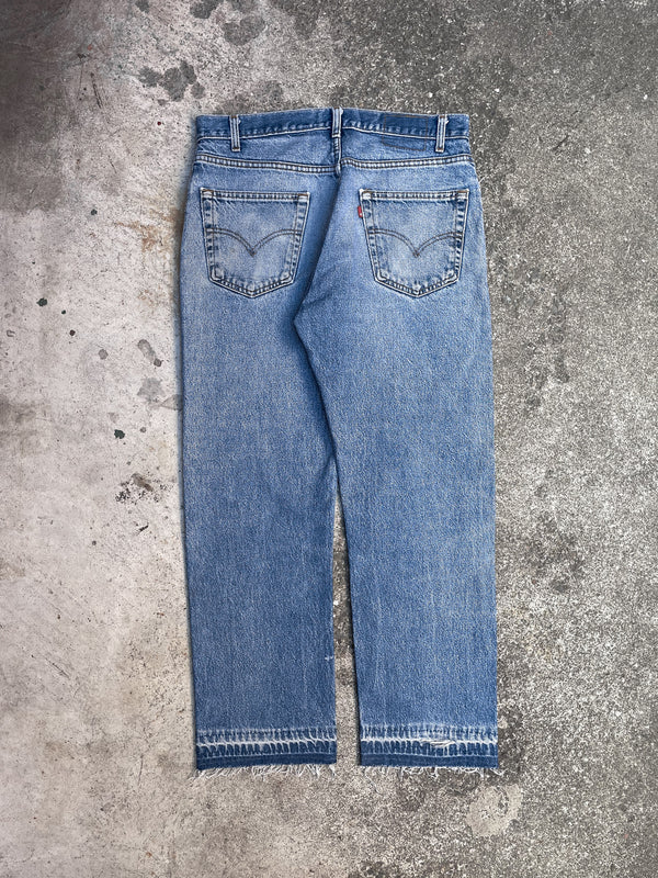 Vintage Levi’s Distressed Faded Blue 505 Released Hem (34X28)