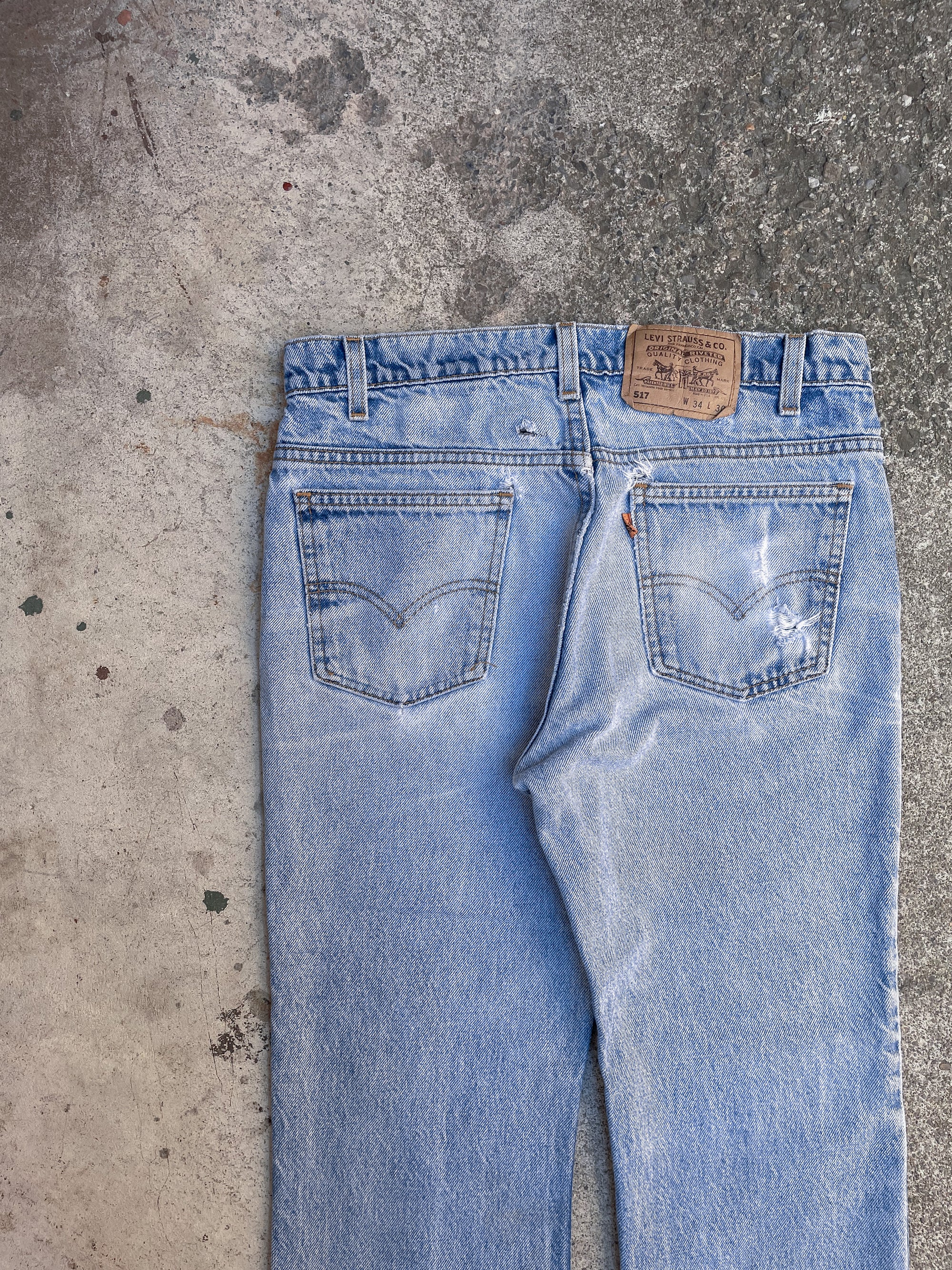 1990s Orange Tab Levis Faded Blue 517 (31X26)