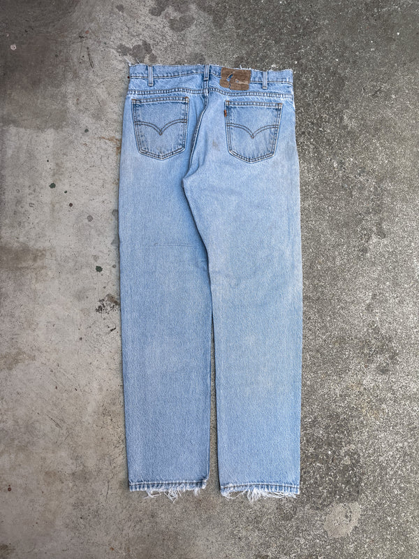 1990s Orange Tab Levi’s Distressed Light Wash Blue 505 (33X30)