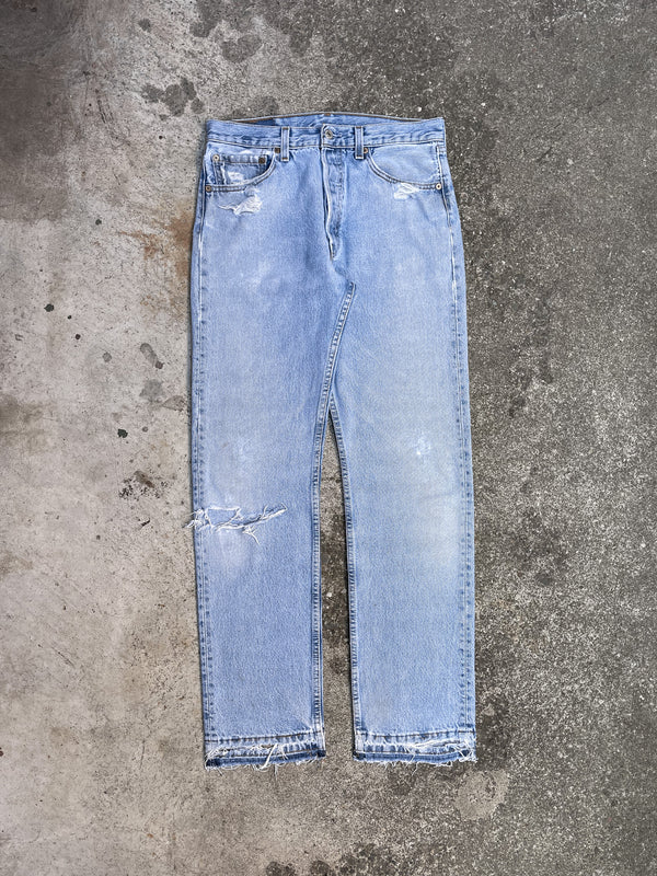 Vintage Levi’s Distressed Faded Blue 501 Released Hem (29X31)