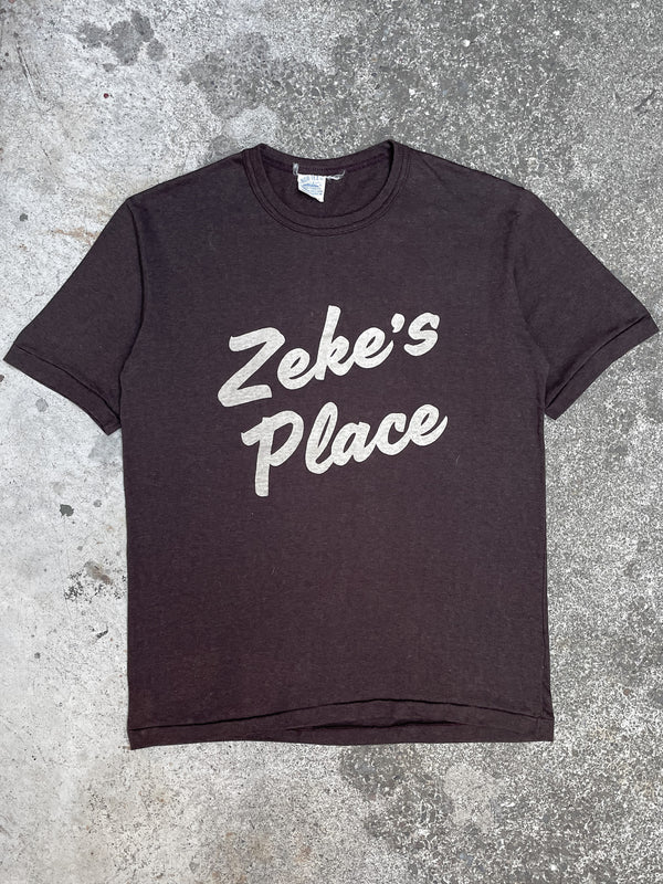 1980s “Zeke’s Place” Brown Single Stitched Tee (M/L)