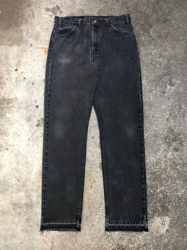 1990s Orange Tab Levis Faded Black 505 Released Hem (34X32)