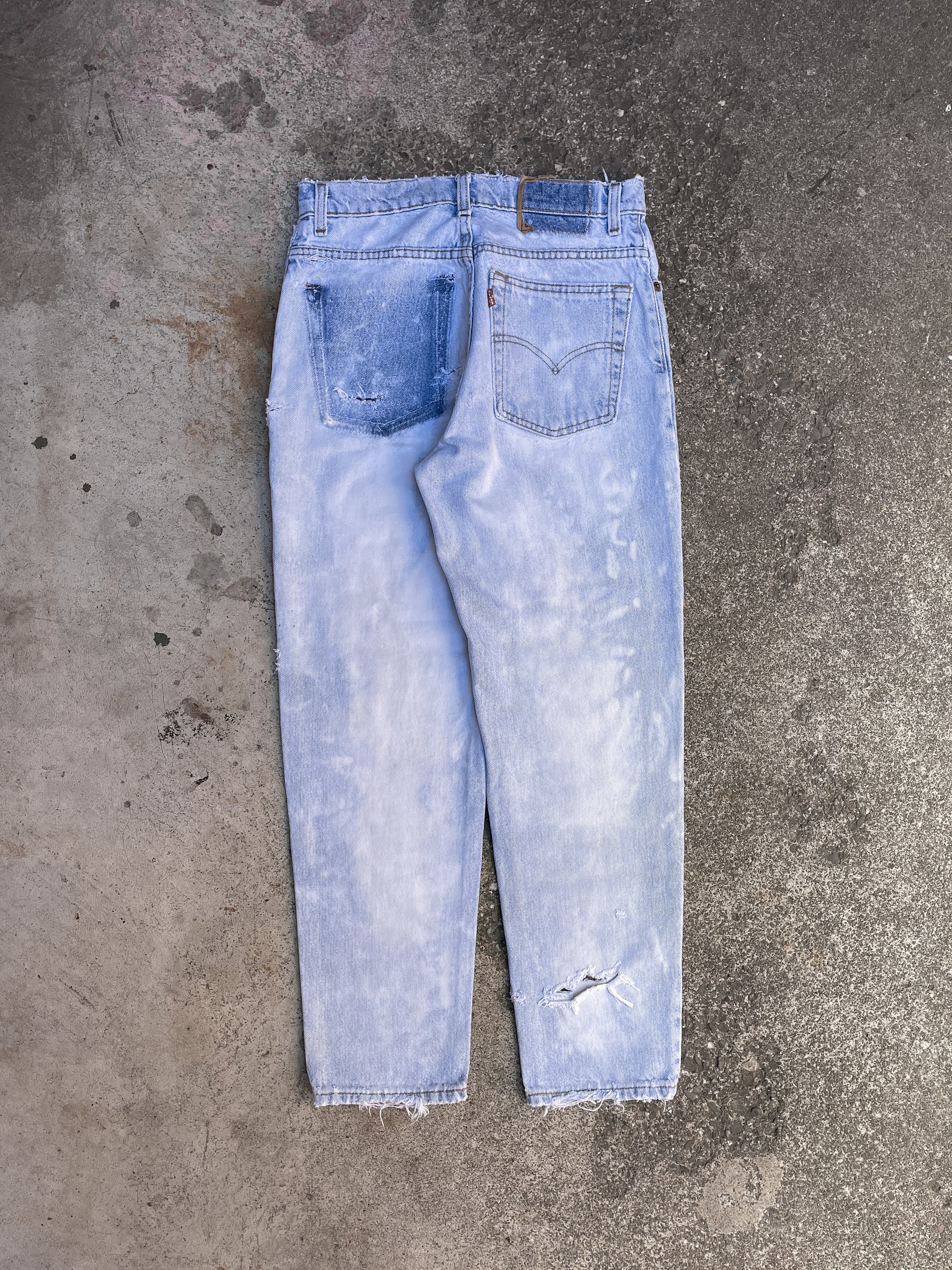 1990s Levi’s Repaired Bleach Blue 550 (27X27)