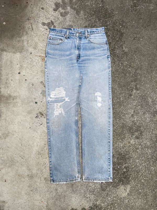 Vintage Levi’s Distressed Faded Blue 505 (30X31)