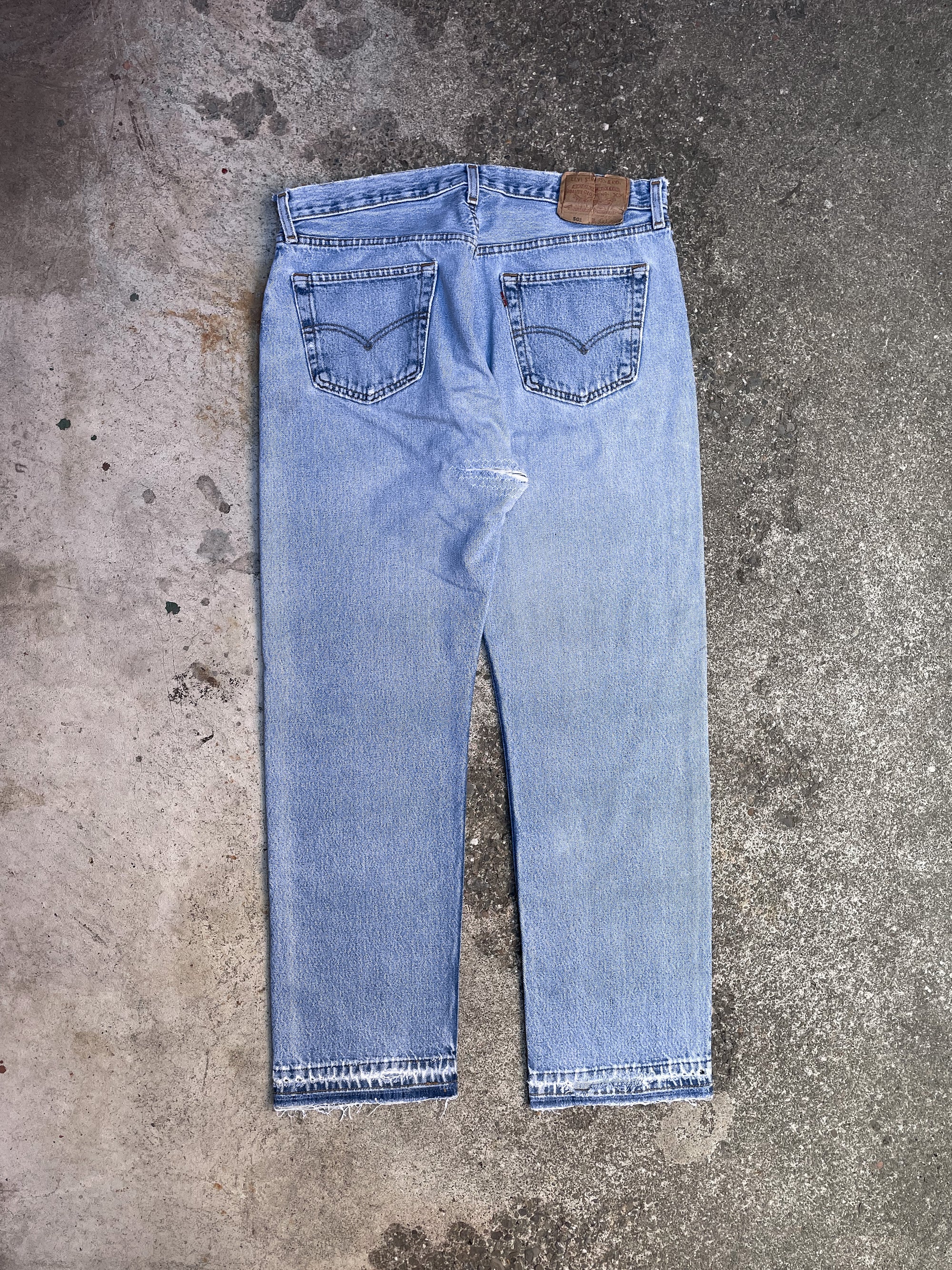 1990s Levi’s Repaired Faded Blue 501 Released Hem (34X30)