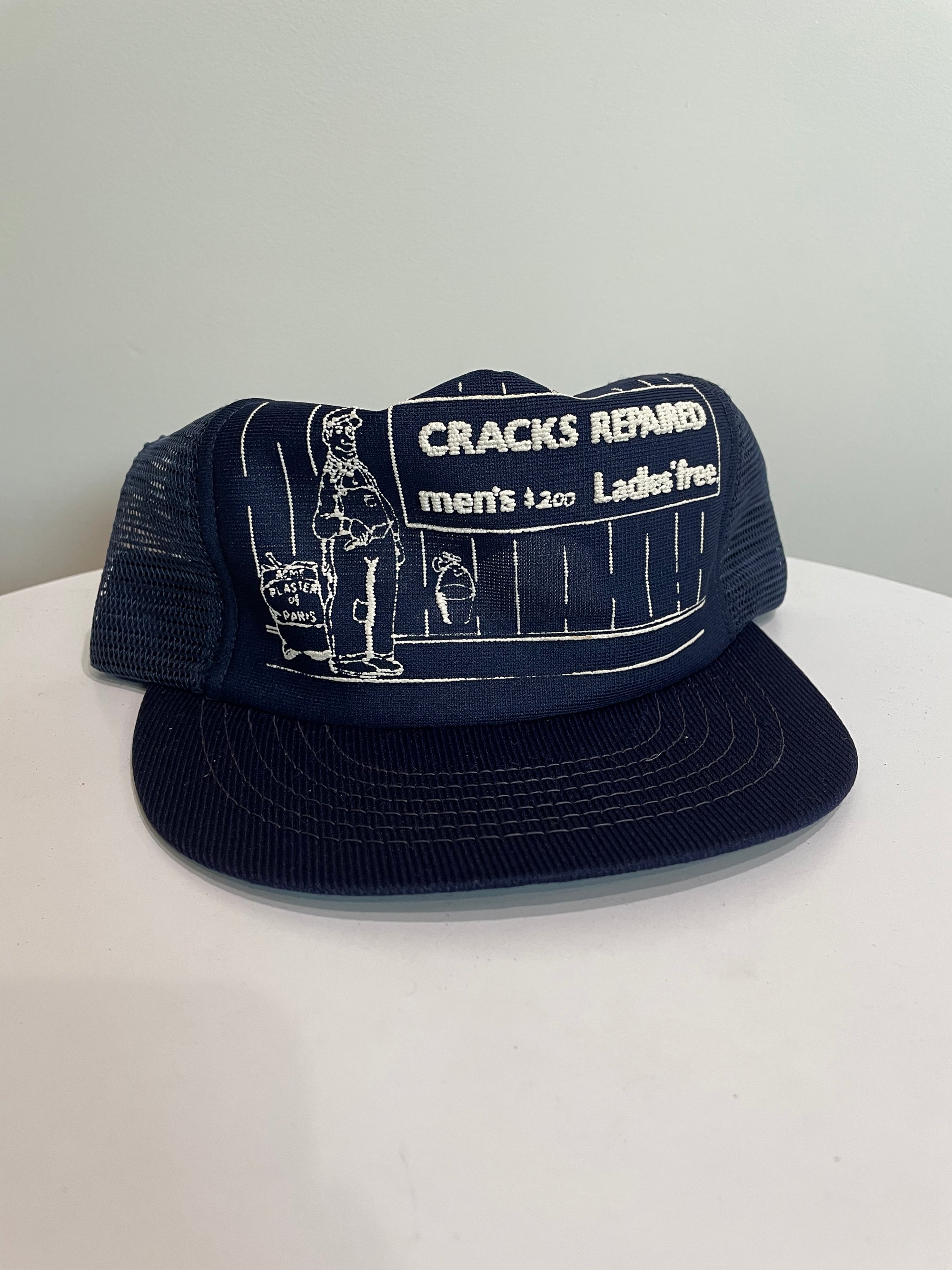 1980s “Cracks Repaired” Trucker Hat