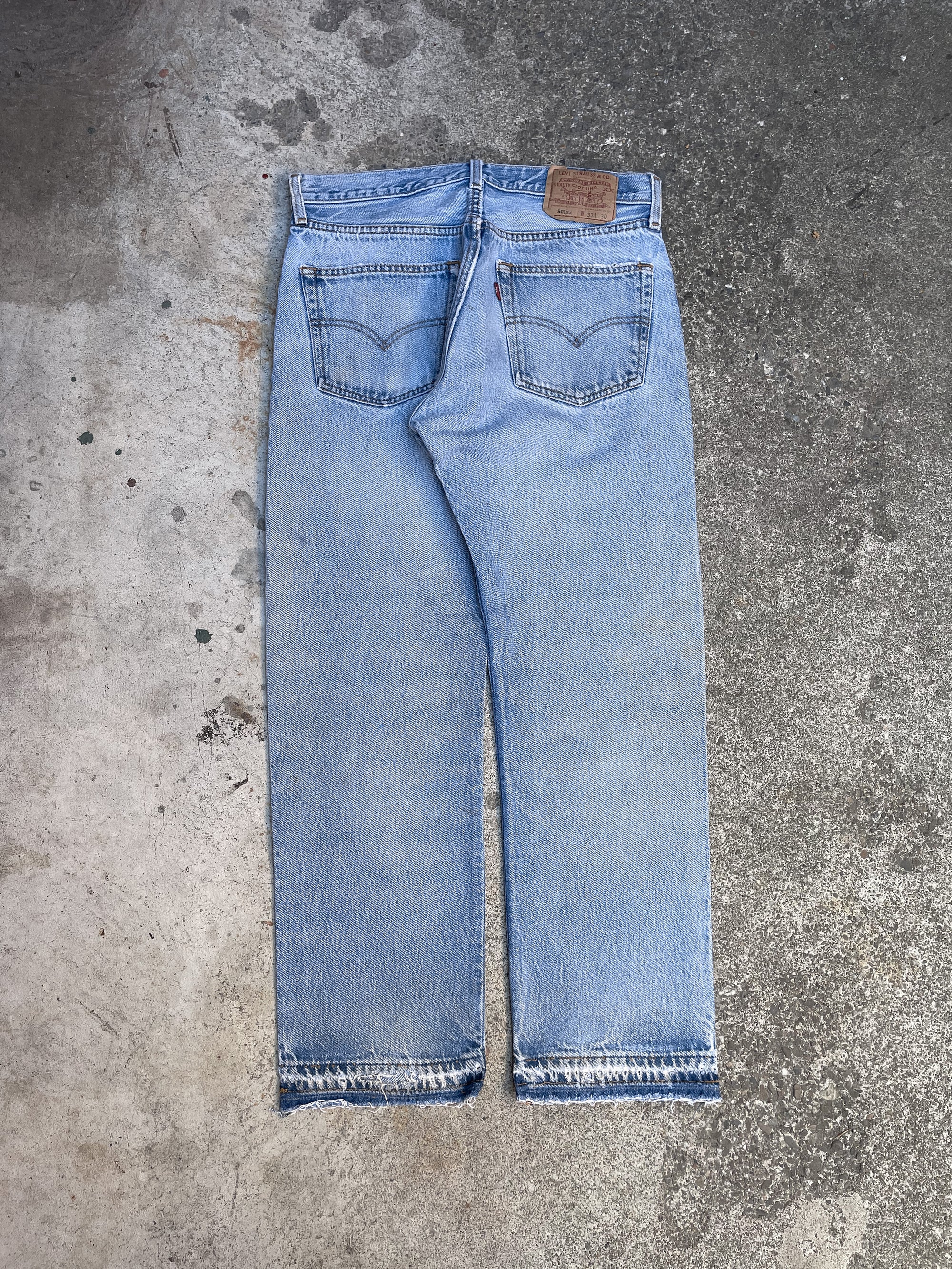 1990s Levis Distressed Repaired Faded Blue 501XX Released Hem (31X27)