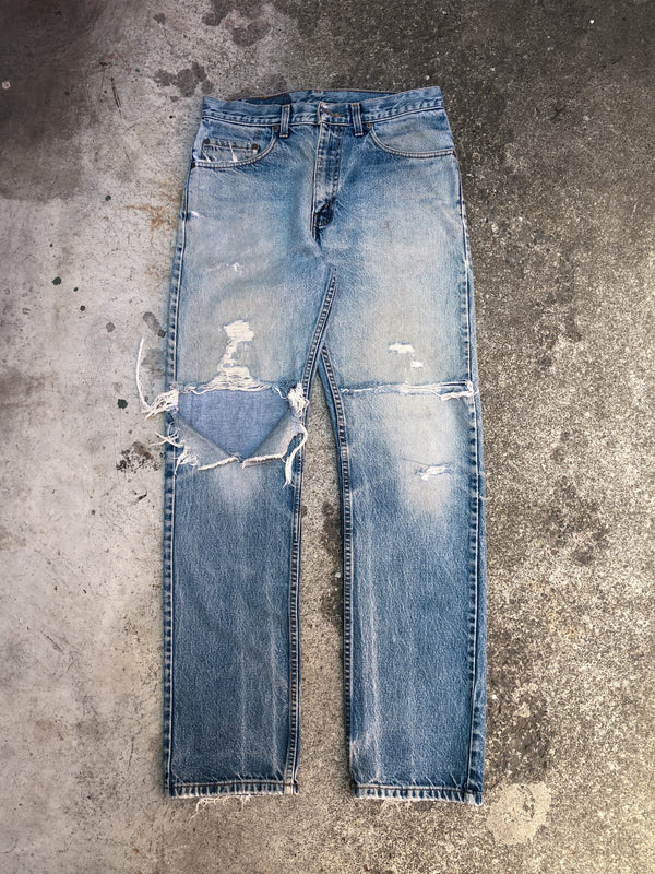 1990s Levis Faded Blue Knee Blowout 505 (31X32)