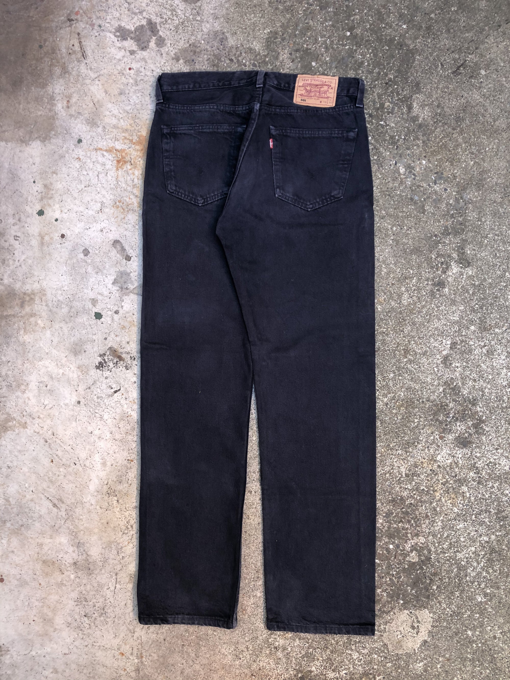 1990s Levis Faded Midnight Oil 501 (31X31)