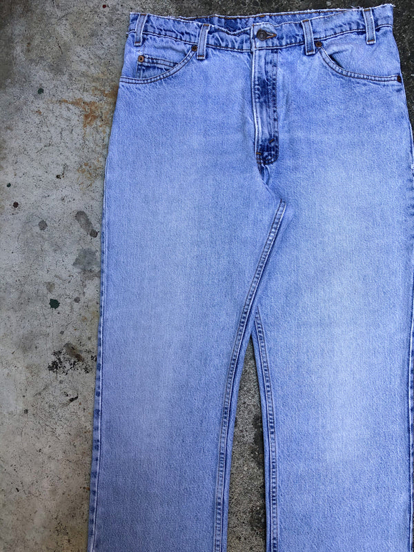 1990s Orange Tab Levis Repaired Faded Blue 518 (33X28)