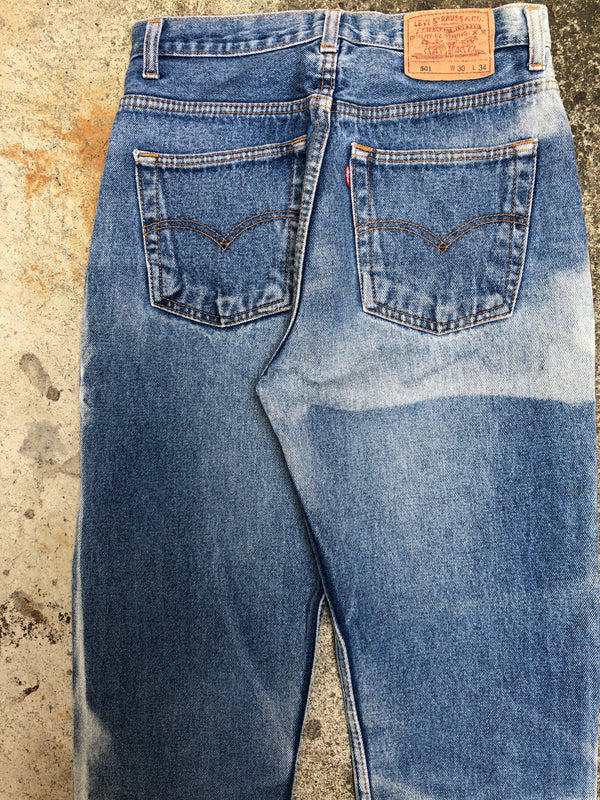 1990s Levis Sun Faded Blue Raw Hem 501 (28X26)