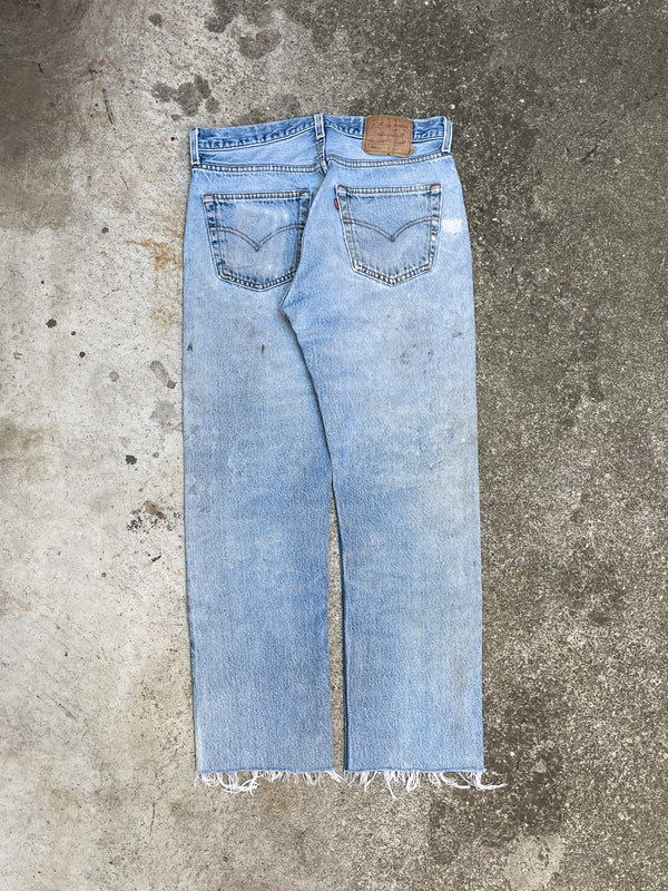 1990s Levi’s Distressed Faded Blue 501XX Raw Hem (30X27)