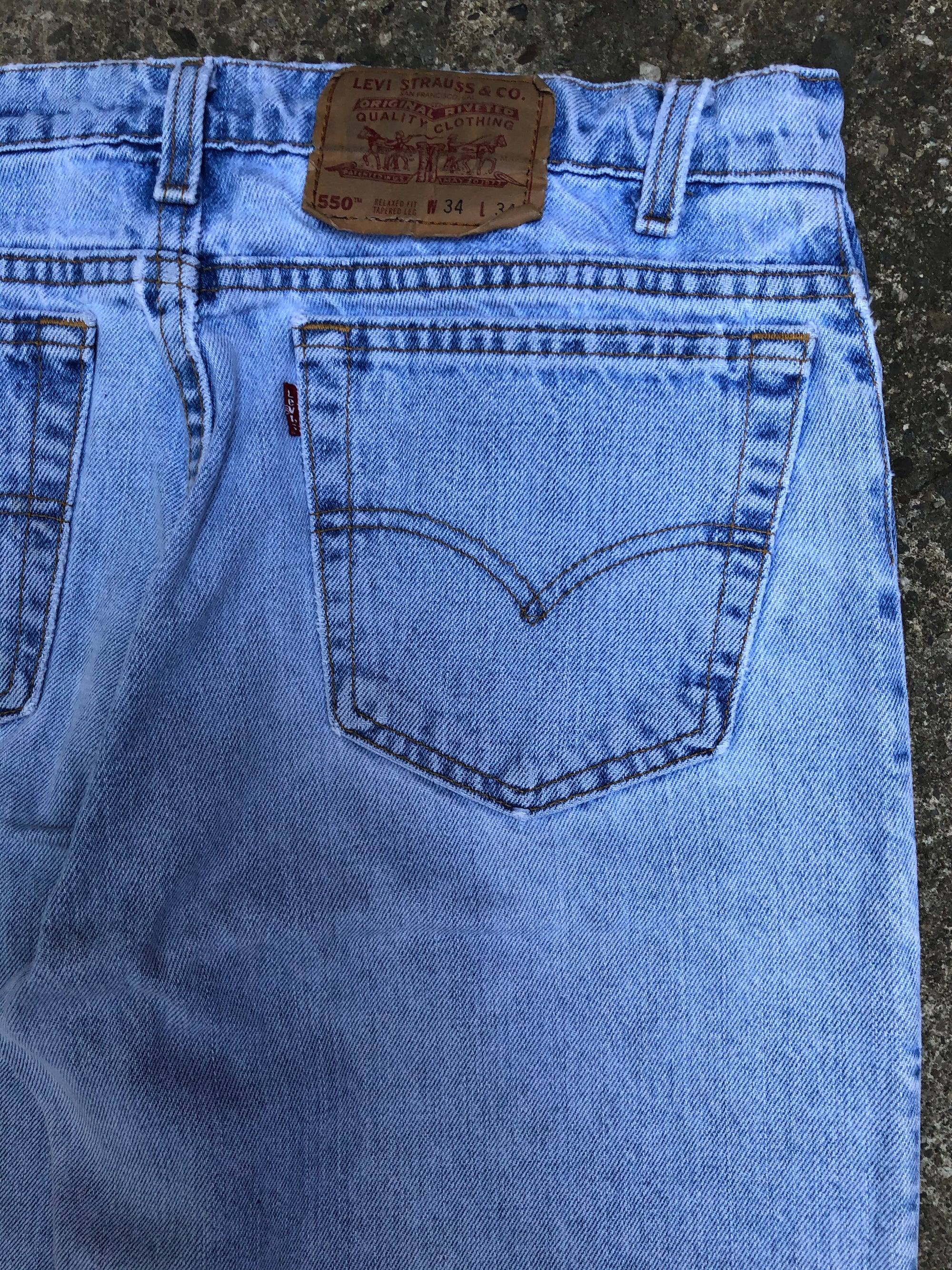 1990s Levis 550 Light Wash Worn In Blue (33X33)